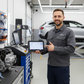 professional technician giving obd2 computer advice 